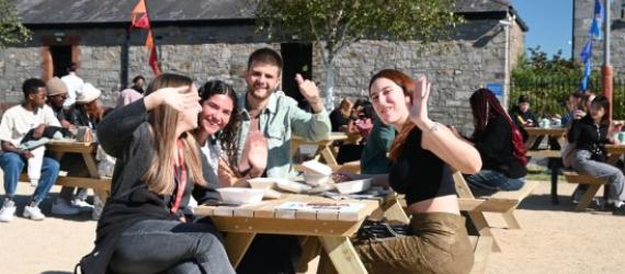 a group of people sitting at a table
