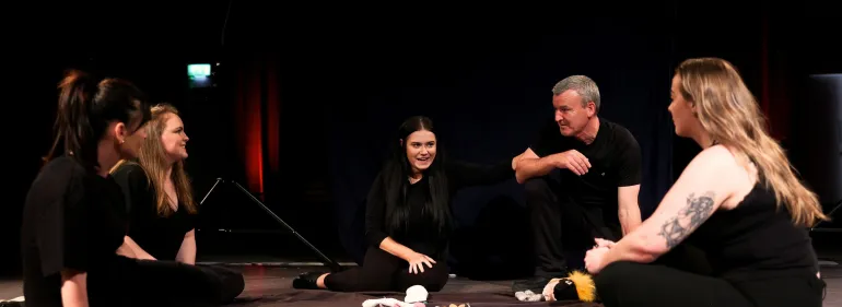 professional practice students sitting in a group
