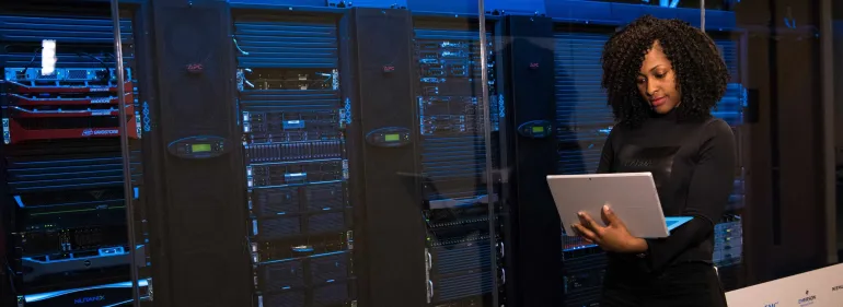 MSc in Cybersecurity woman with computer