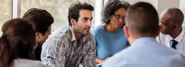 a group of people looking at the camera