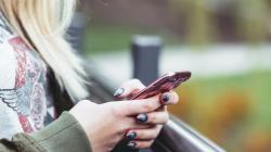 a person holding a cell phone
