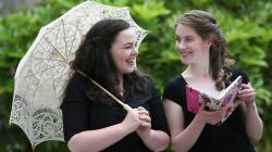 a woman holding an umbrella