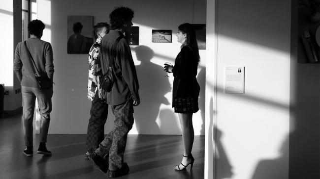 a couple of people that are standing in a room