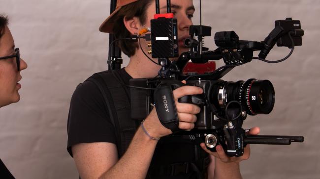 a man holding a camera