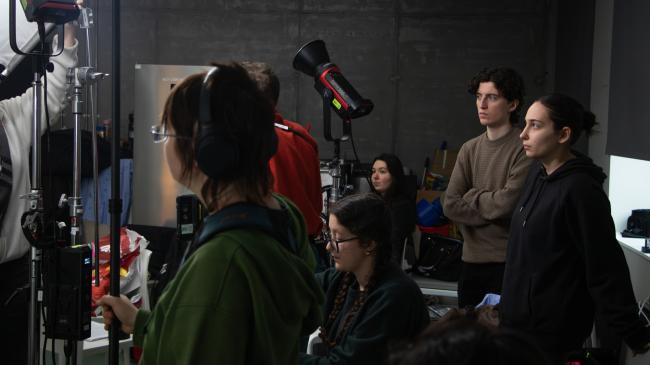 a group of people standing in a room