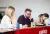 a group of people sitting at a table