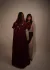 Two models, one facing the camera and one facing away