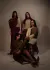 Four models posed against white backdrop