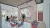 A welcoming café within the early learning center featuring a pink textured service counter, playful breakfast-themed wall graphics, terrazzo flooring, and colorful seating that creates a warm and family-friendly social space for children, parents, and staff.