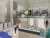 a kitchen with a sink and a mirror