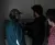 a group of people standing in a room