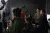 a group of people standing in a room