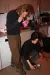 a man and a woman standing in a kitchen