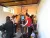 a group of people standing in a room