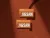 9-	2 Jigsaw support card fronts displayed on an orange wall,  the front contains a large Jigsaw logo and “A Safe Space – Support Information”