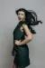 A model posing to the side to show off arm detail.