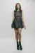 A model wearing a black denim dress.
