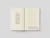 Open book displayed flat, highlighting layout consistency and typography across spreads.
