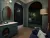 Image shows a guest bedroom render with teal panelled walls, arched bed alcove, dark green wallpaper, brass lighting, marble-topped mini bar, blue sofa, red curtains and warm timber flooring. 