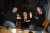 a group of people sitting at a table