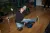 a young boy sitting on the floor