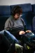 a person sitting on a couch