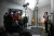 a group of people standing in a room