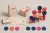 The image presents the full game system on a neutral beige background, including packaging, prompt cards, and colourful interlocking pieces. On the left, two packaging designs are displayed: a standing box and a sliding drawer-style box, both featuring abstract flowing line graphics in blue, pink, and orange with the handwritten-style Unprompted logo and the tagline “Create without undo.” Below the packaging is a stack of square prompt cards alongside several displayed examples with creative instructions su