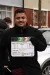 a man holding a sign