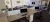 a desk with a laptop in a living room