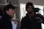 a couple of people that are looking at the camera