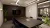 a room filled with furniture and a large window