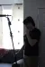 a person standing in front of a mirror posing for the camera