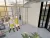 a room filled with furniture and a large window