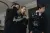 a group of people standing in a room