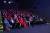 a group of people sitting in front of a crowd
