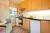 a kitchen with a stove top oven sitting inside of a refrigerator