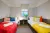 a bedroom with a bed in a room