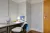 a bedroom with a large mirror