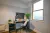 a room filled with furniture and a window