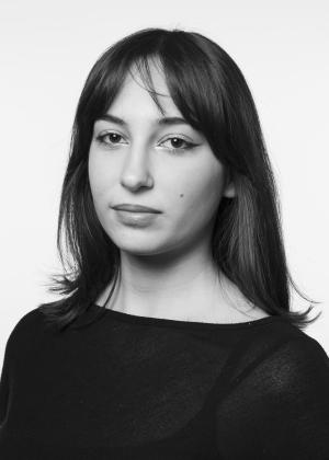 a woman looking at the camera