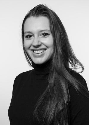 a woman who is smiling and looking at the camera