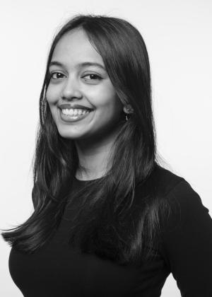 a woman who is smiling and looking at the camera