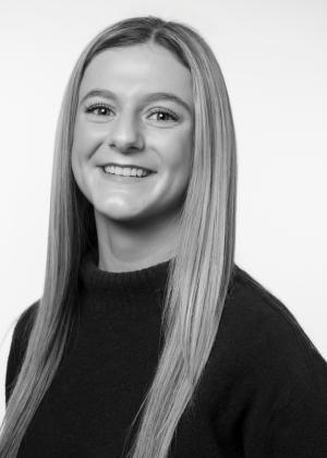 a woman smiling for the camera