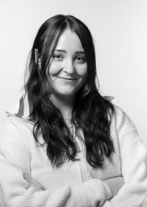 a woman smiling for the camera