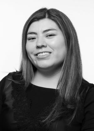 a woman who is smiling and looking at the camera