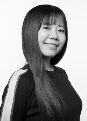 a woman who is smiling and looking at the camera