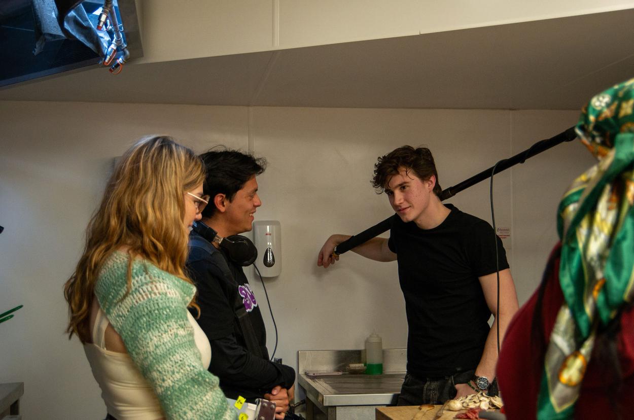 a man and a woman standing in a room