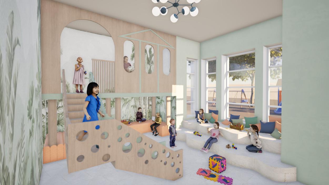 An active sensory room on the ground floor featuring a multi-level timber play structure, soft seating steps, playful cut-out details, calming pastel tones, and large windows that create an interactive environment for movement, social play, and sensory engagement.