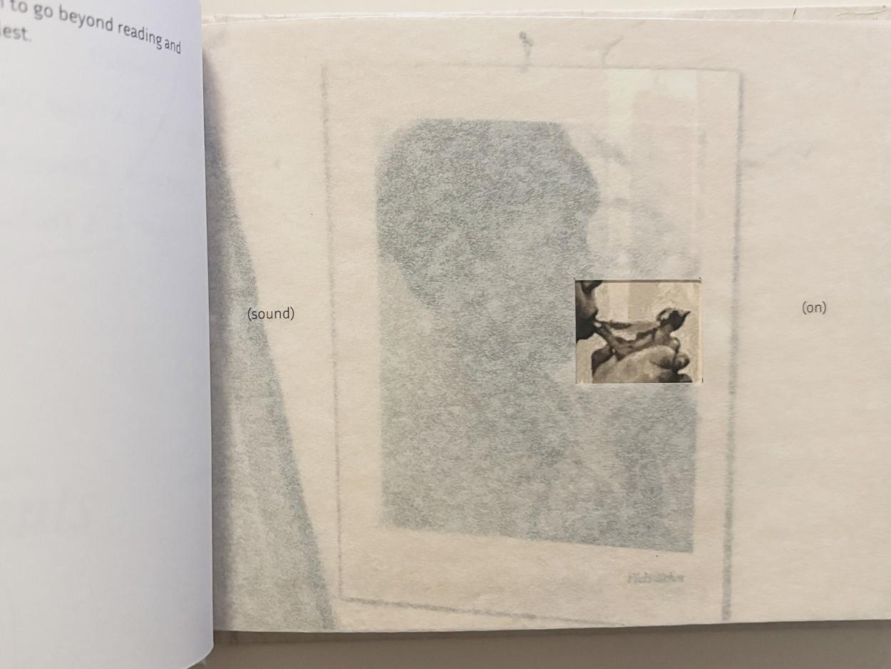 A vellum overlay with a faint silhouette and the words “sound” and “on” framing a die-cut window that reveals a vintage photo of a child using the whistle.